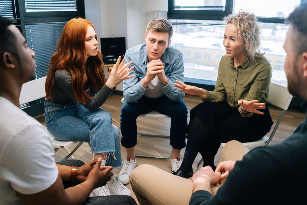 a group sits and talks during outpatient rehab los angeles