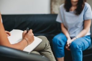 a perso speaks with a therapist during an Intervention san diego