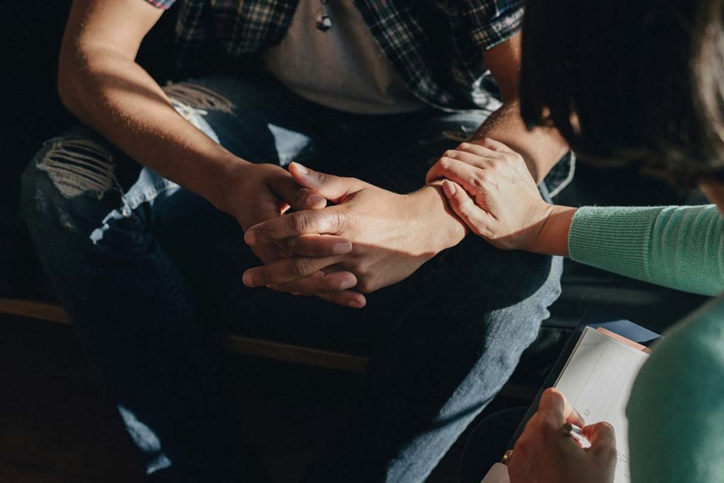 family members gather to help a person with an Early intervention for substance abuse